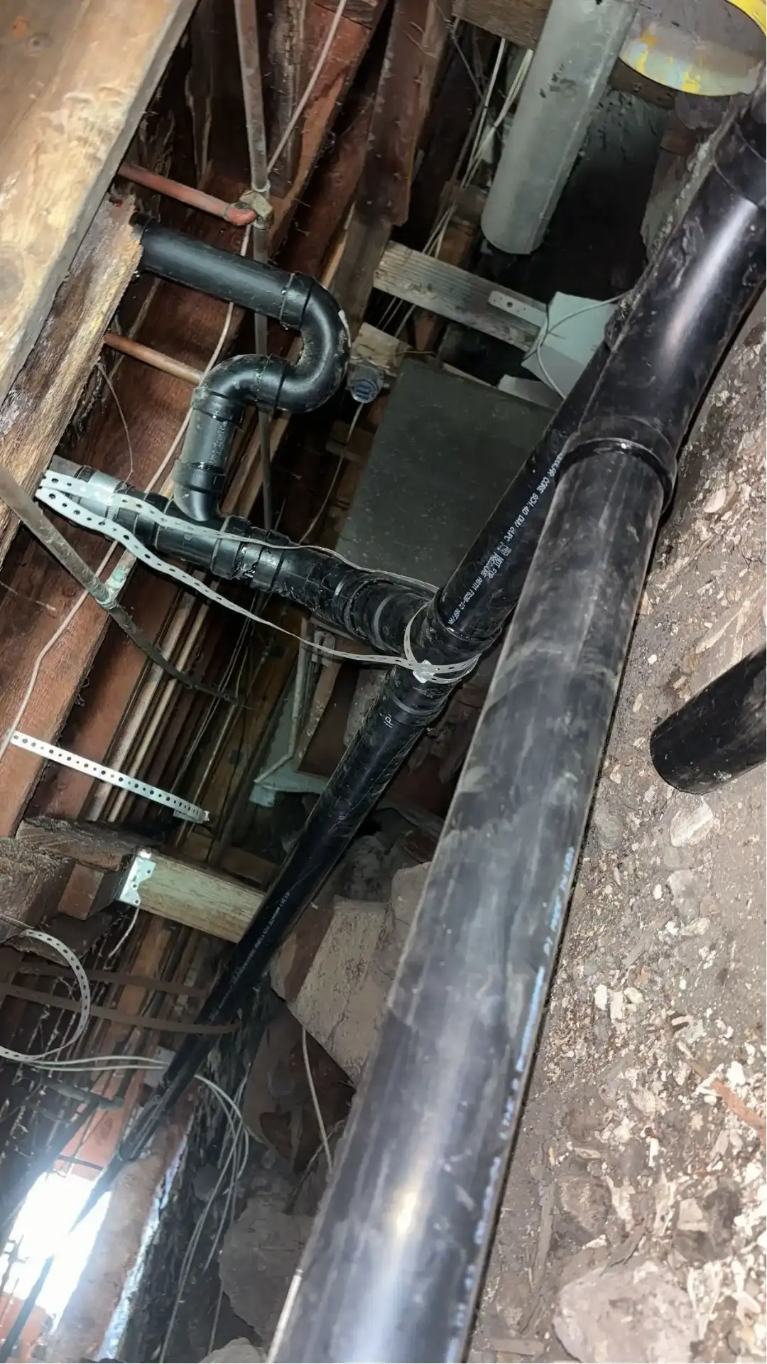 ABS drain and waste repipe under a Costa Mesa home